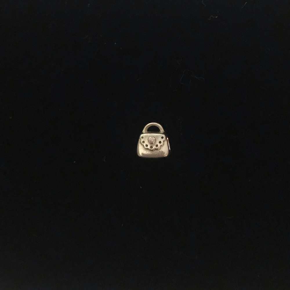 Pandora silver clutch charm with pink stone